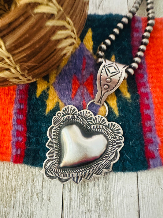 Handcrafted Sterling Silver Heart Concho Pendant by Leander Tahe