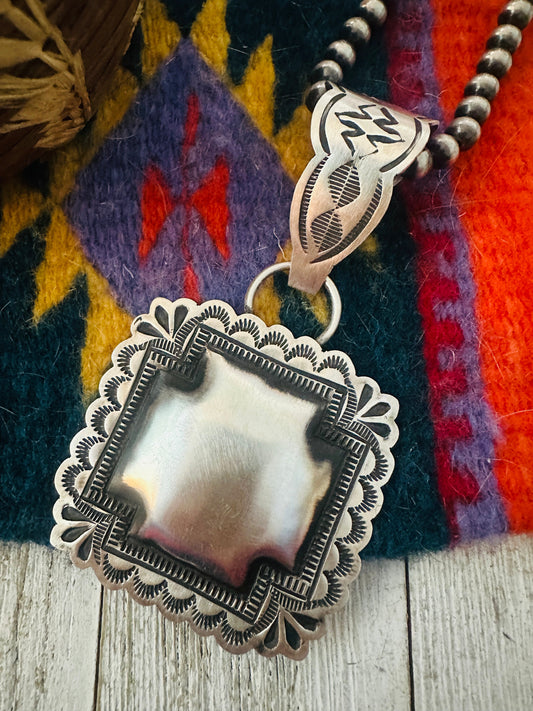 Handcrafted Sterling Silver Cross Concho Pendant by Leander Tahe