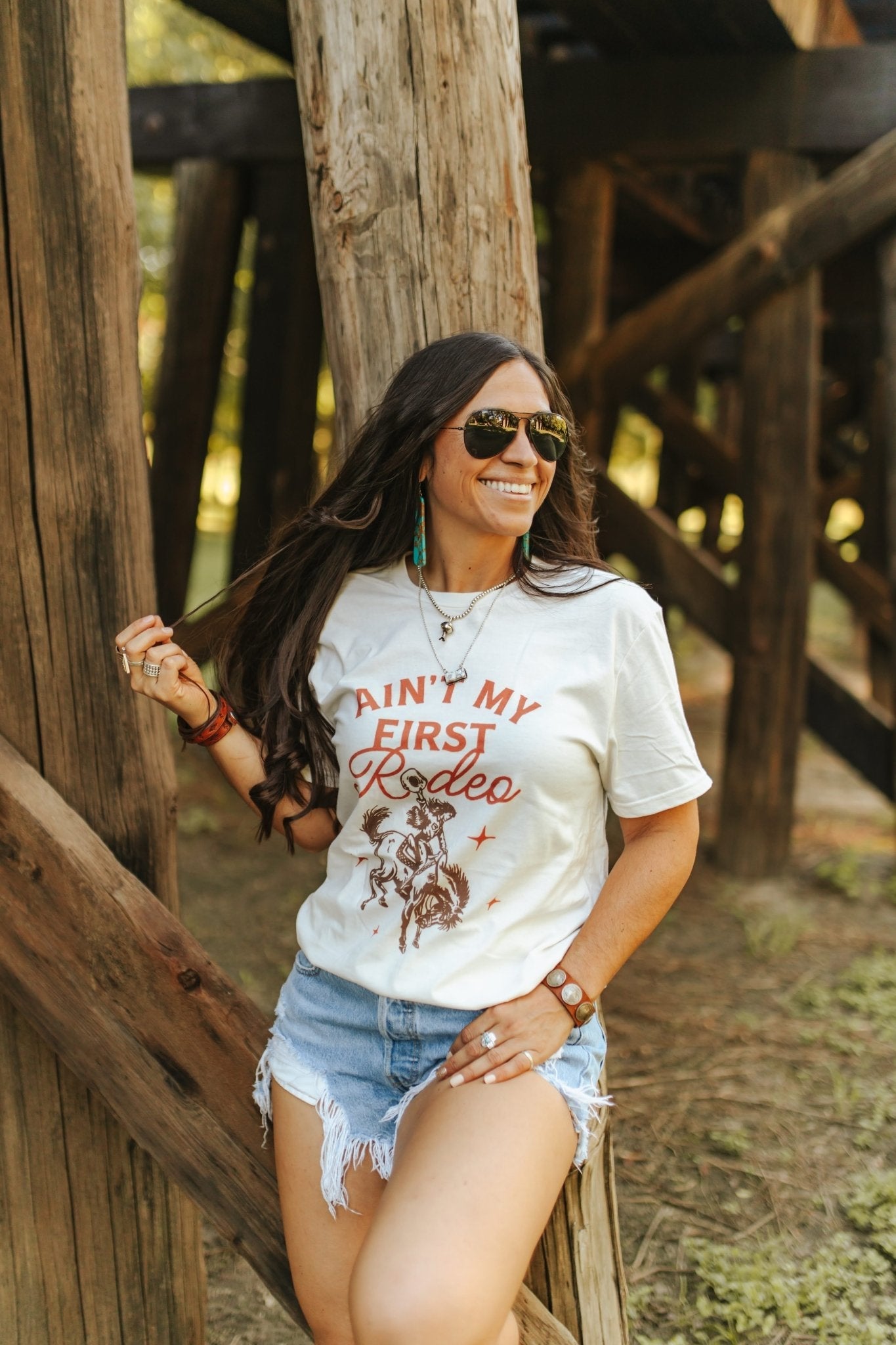 Ain't My First Rodeo Cowgirl Graphic Tee