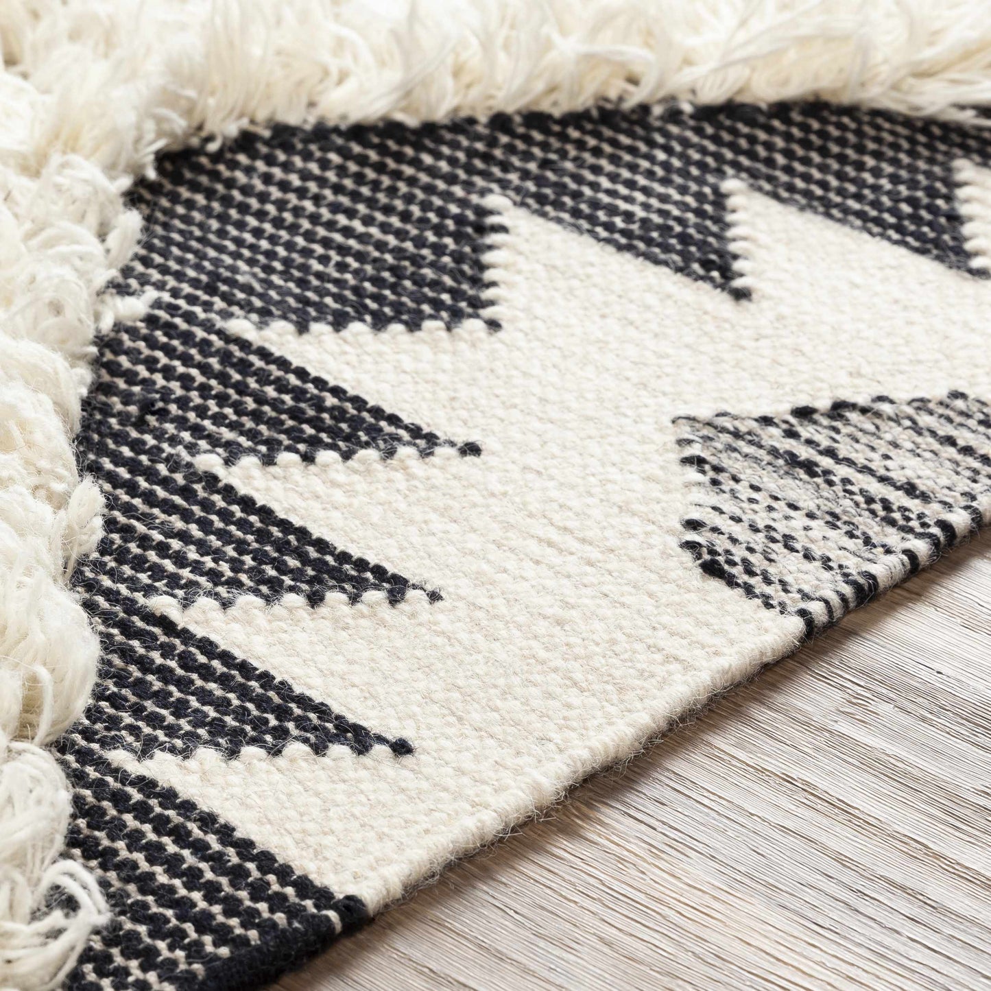 Jarales Cream/Black Tribal Tassel Wool Rug