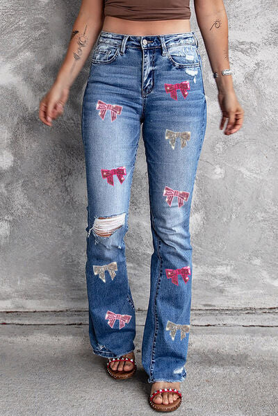 Sequin Bow Distressed Bootcut Jeans 31-32" inseam