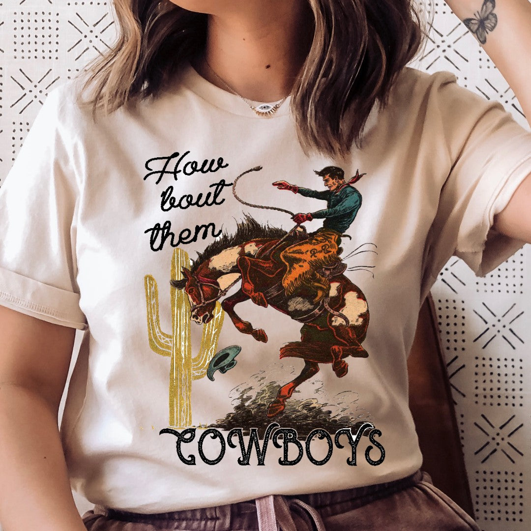 How 'Bout Them Cowboys Tee - baha ranch, bronc, bronc rider, bronco, broncos, broncrider, broncriding, broncs, cowboys, cowgirl, cream, cream tee, graphic, graphic t, graphic tee, graphic tees, how bout, how bout them cowboys, southwestern, tee, tshirt, unisex, unisex tee, western, westerngraphictee -  - Baha Ranch Western Wear