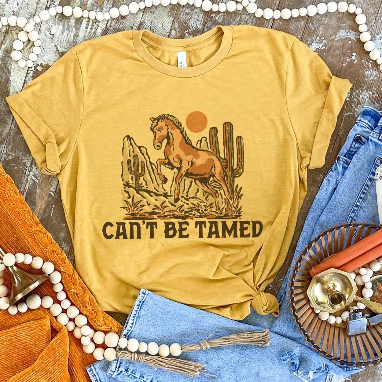 Can't Be Tamed Tee - cactus, cowgirls, desert, farm, graphic, horse, shirt, sunflower, tee, tees, western -  - Baha Ranch Western Wear