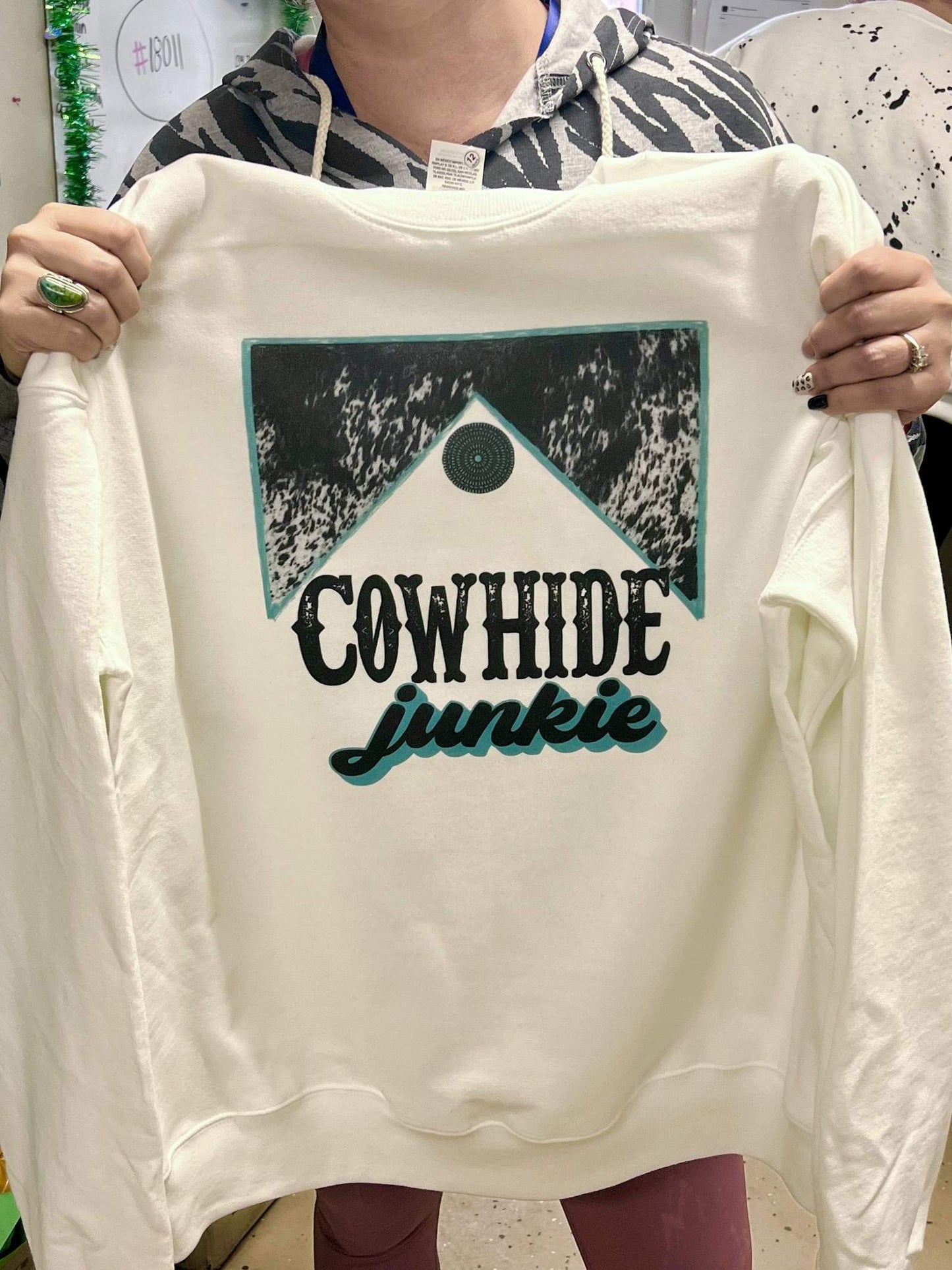 Cowhide Junkie Sweatshirt - cowgirl, cowhide, junkie, southwestern, sweat shirt, sweater, sweatshir, sweatshirt, western, white, white sweatshirt -  - Baha Ranch Western Wear